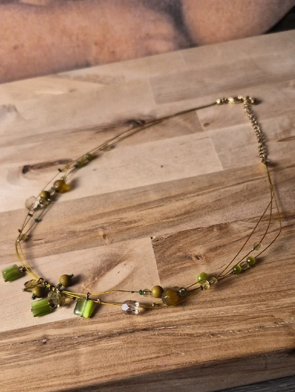 Delicate Green Multi-Strand Beaded Necklace with Gold Accents